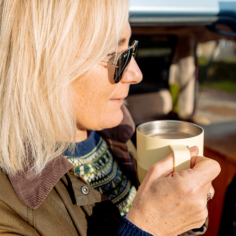 12oz-rise-mug-q2 12oz_rise_coffee_mug_wax_yellow_woman_drink_closeup_square.jpg