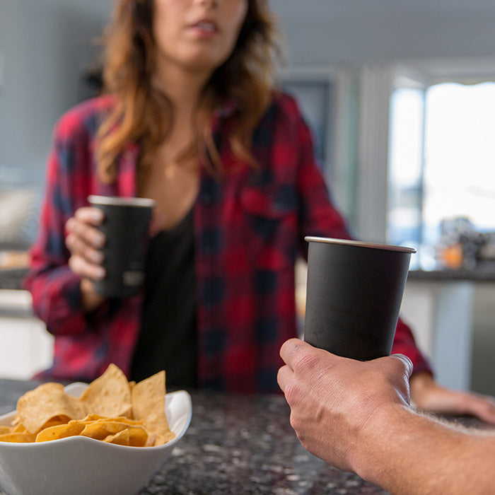 16oz-pint-cup-i1 16ounce_steel_pint_cup_black_party_lifestyle_e7c4b89f-bee2-44df-bb63-bc286febb421.jpg