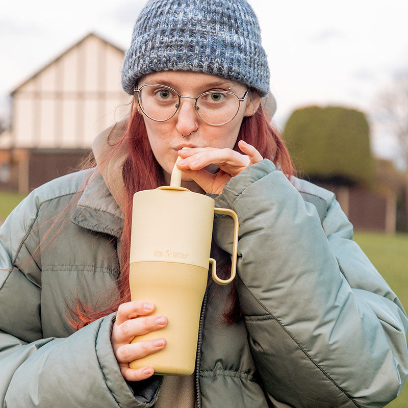 26oz-rise-tumbler-with-straw-lid-l3 26oz_rise_rumbler_straw_wax_yellow_woman_sip_square.jpg