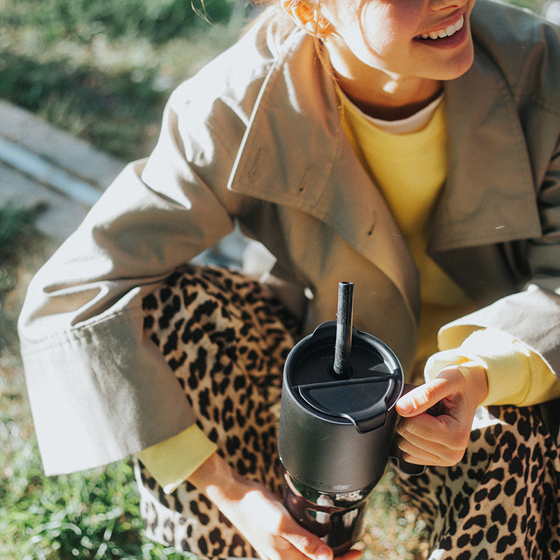 26oz-rise-tumbler-with-straw-lid-l3 26oz_rise_tumbler_black_woman_topview_square.jpg