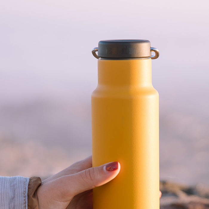 classic-loop-cap-i9 K12VCNPPL-MG-loop-cap_yellow_bottle_lifestyle.jpg