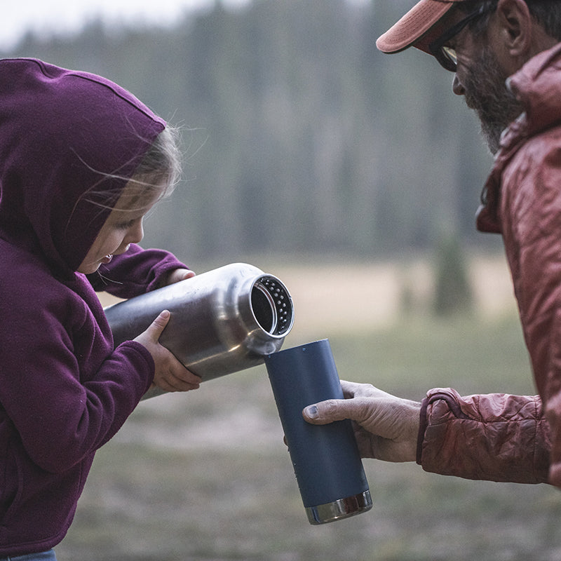 64oz-tkwide-with-loop-cap-u4 tkwide_64oz_bottle_girl_dad_filling_square.jpg